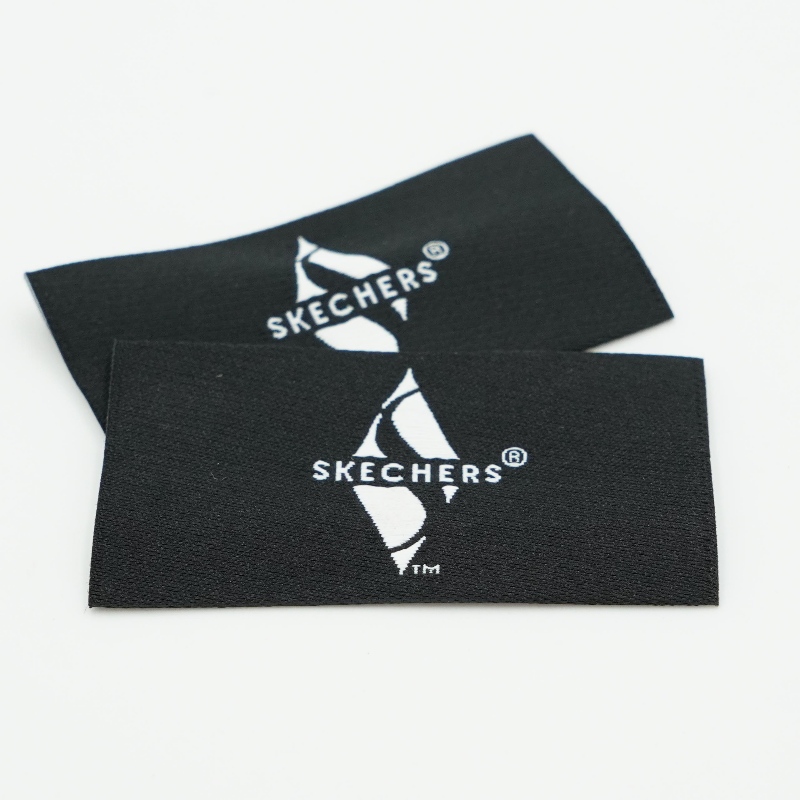 تصميمات الملابس بالجملة تصميمات الشعار المخصصة قميص قميص العلامات ملابس القطن العلامة التجارية ملصقات الملابس المنسوجة البيئة و...